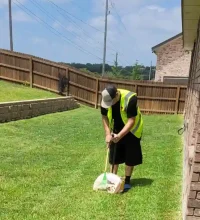 Technician on site scooping